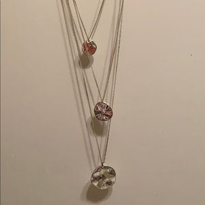 USED. Triple disc silver layered necklace.